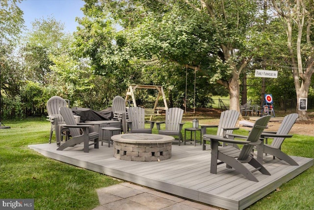 355 Orchard Dr, Mount Jackson, VA 22842 - wooden deck featuring an outdoor fire pit, a lawn, and view of wooded area