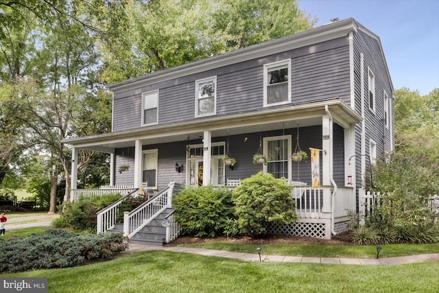 country-style home featuring a porch