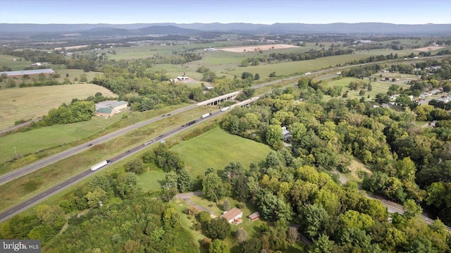 drone / aerial view featuring a mountain view