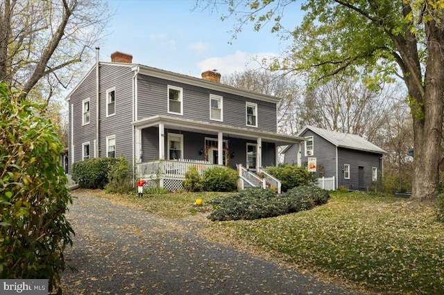 355 Orchard Dr, Mount Jackson, VA 22842 - view of front facade featuring a chimney and a porch