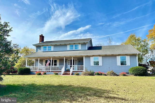 view of front of property featuring a porch and a front lawn