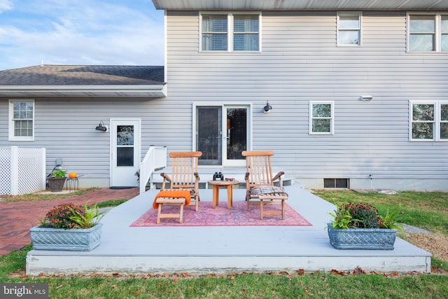 rear view of property featuring a patio