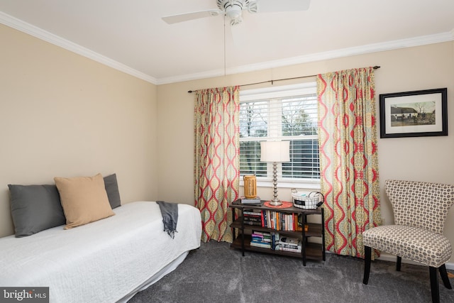 bedroom featuring carpet, ceiling fan, and crown molding