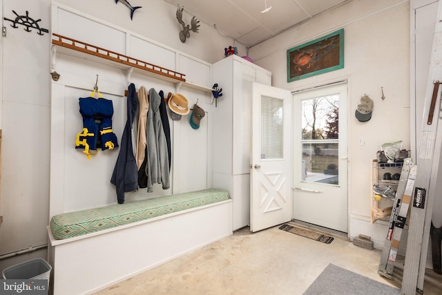 mudroom with concrete floors