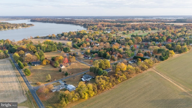 aerial view with a rural view and a water view