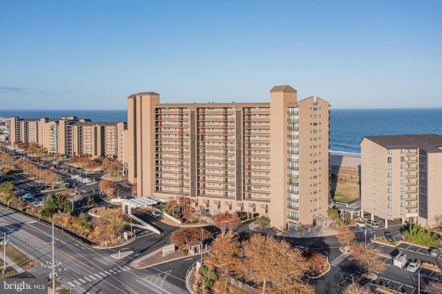 view of building exterior with a water view