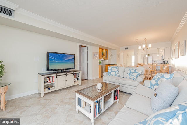 tiled living room featuring a textured ceiling, crown molding, and a notable chandelier