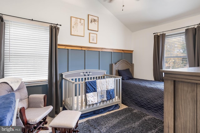 bedroom featuring lofted ceiling