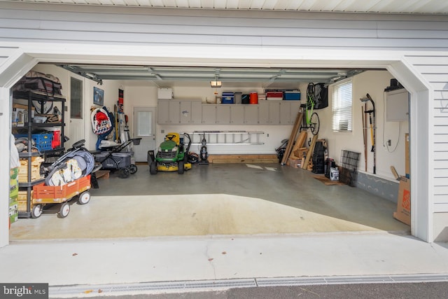 garage featuring a garage door opener