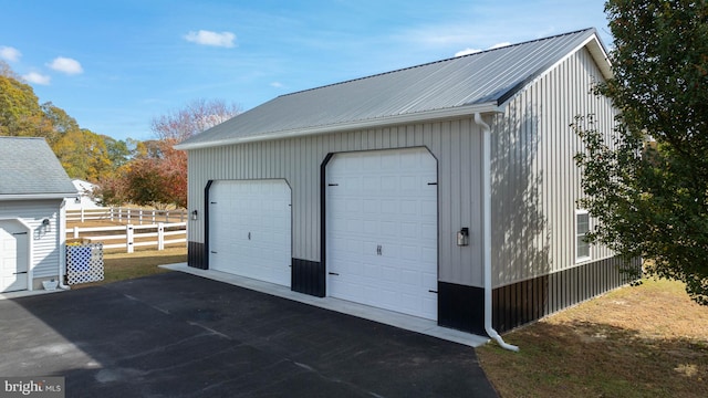 view of outdoor structure featuring a garage