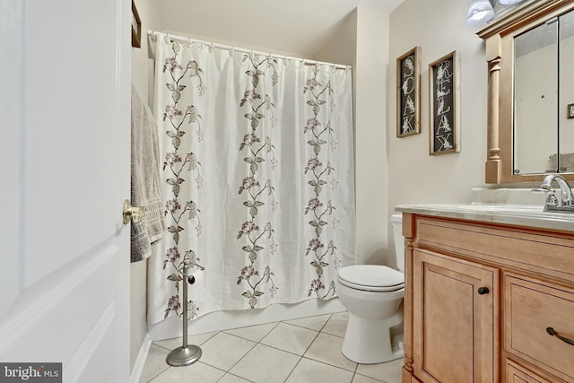 bathroom featuring tile patterned floors, vanity, toilet, and a shower with shower curtain