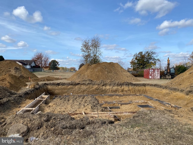 view of yard with a rural view