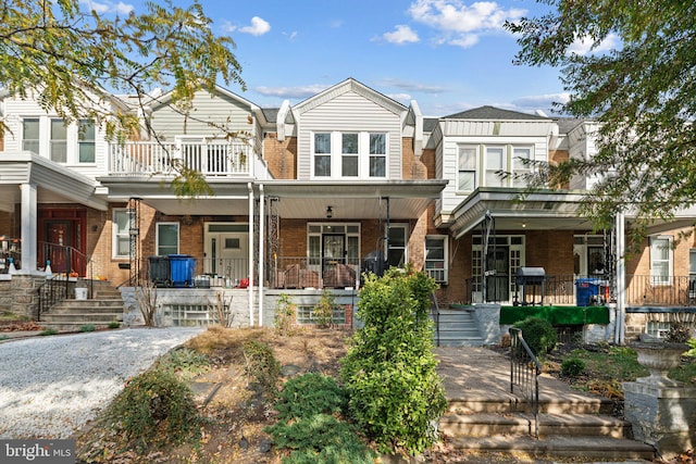 view of property with a porch