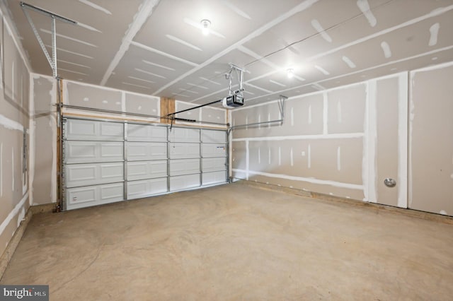 garage featuring a garage door opener