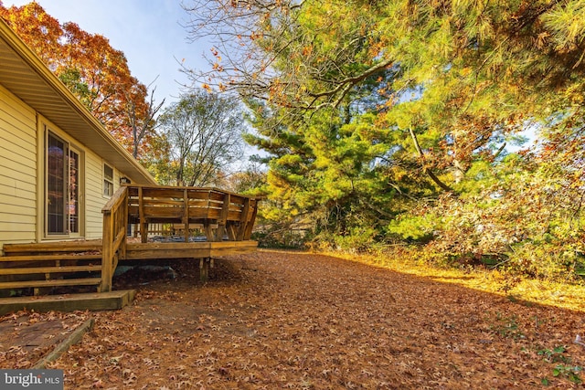 view of yard with a deck