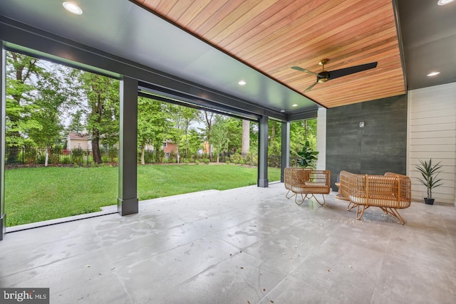 view of patio featuring ceiling fan