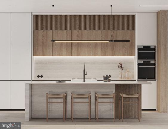 interior space featuring hardwood / wood-style floors and sink