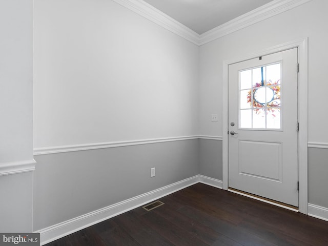 doorway to outside featuring dark hardwood / wood-style flooring and crown molding