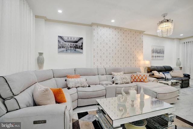 living room featuring an inviting chandelier and crown molding