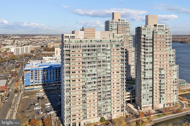 property's view of city with a water view