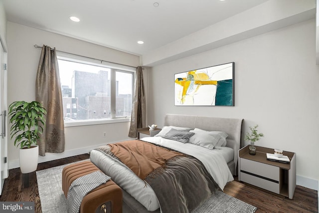 bedroom featuring dark hardwood / wood-style floors