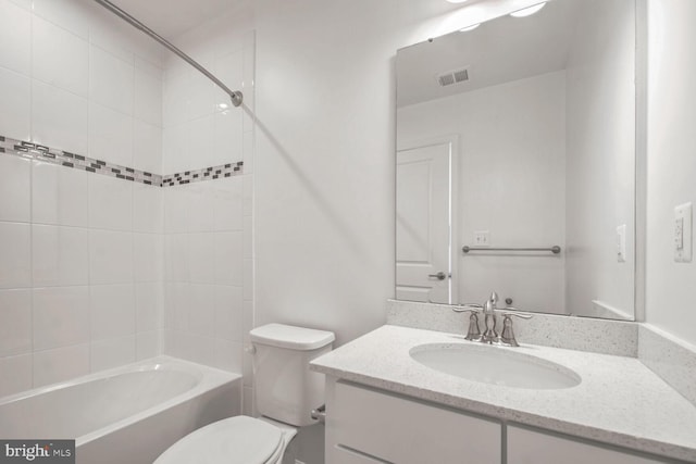 full bathroom featuring vanity, toilet, and shower / bathtub combination