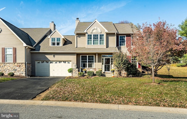 view of front of home with a front lawn