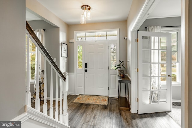 foyer featuring dark wood-type flooring