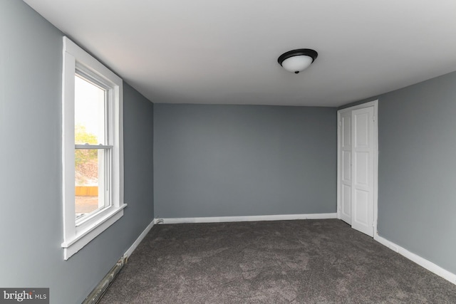 view of carpeted spare room