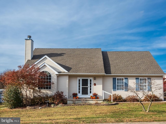 view of front facade with a front lawn