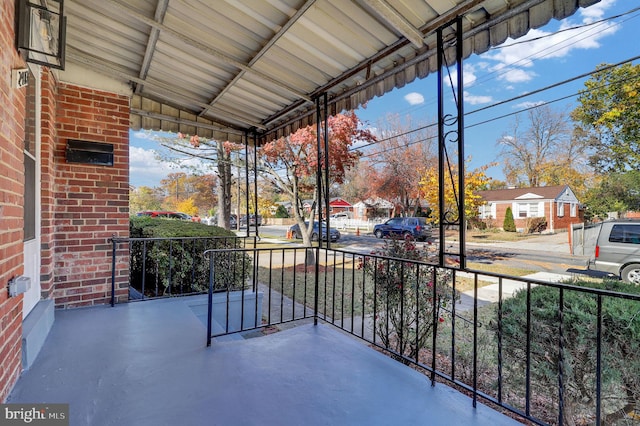 balcony featuring a porch