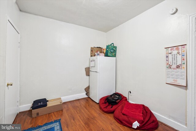 miscellaneous room with hardwood / wood-style flooring