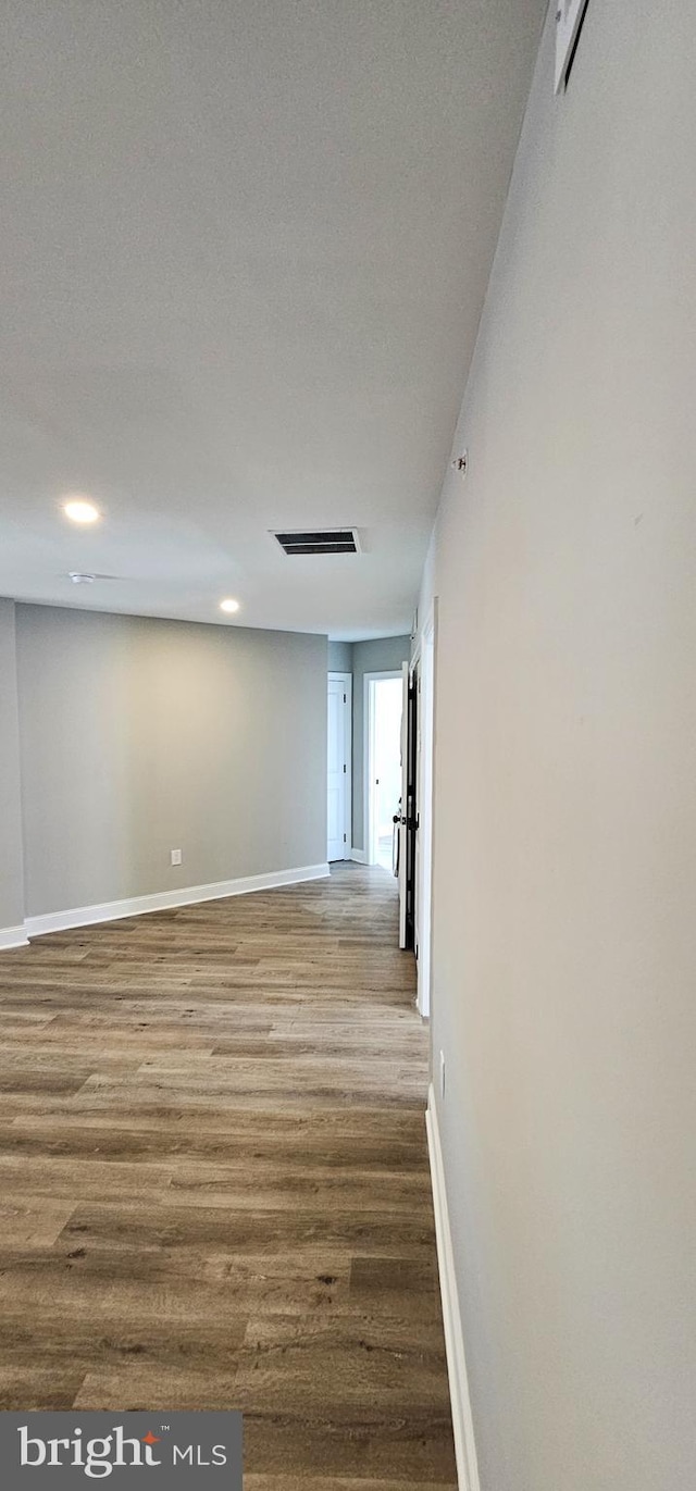 interior space with hardwood / wood-style floors