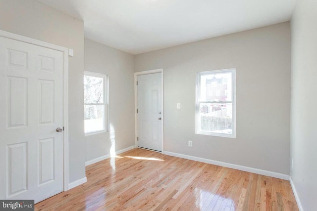 foyer with light hardwood / wood-style floors