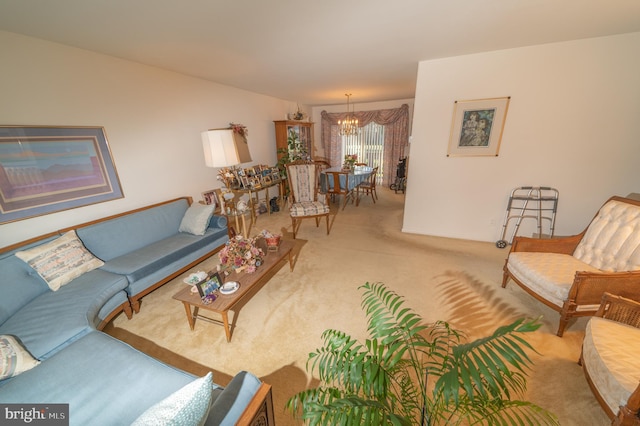 living room with an inviting chandelier and carpet