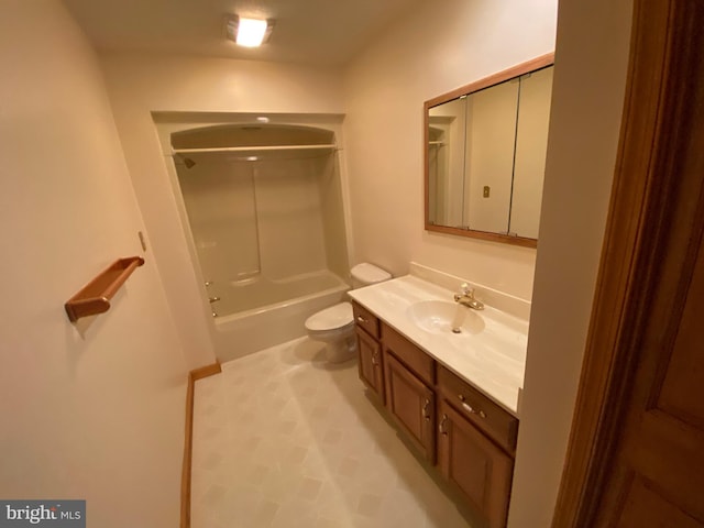 full bathroom featuring vanity, bathing tub / shower combination, and toilet