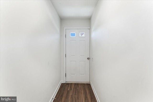 doorway featuring dark hardwood / wood-style floors