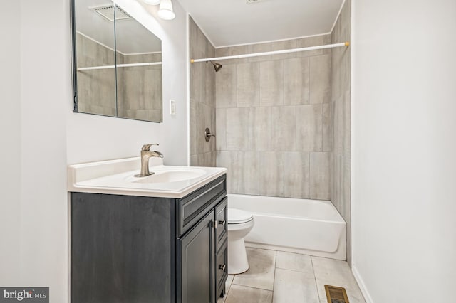 full bathroom with toilet, vanity, tile patterned floors, and tiled shower / bath combo