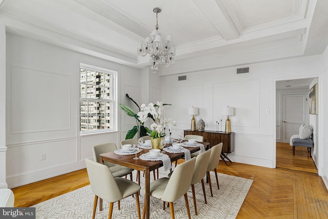 dining space featuring beam ceiling, light parquet flooring, ornamental molding, and a notable chandelier