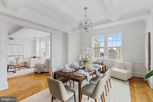 dining space with a wealth of natural light, light parquet floors, and ornamental molding