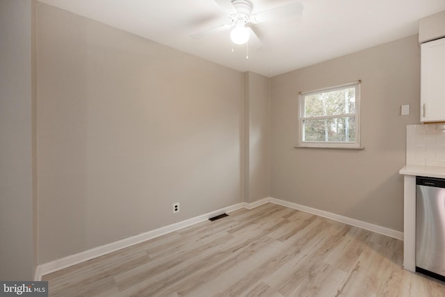 interior space featuring light hardwood / wood-style floors and ceiling fan