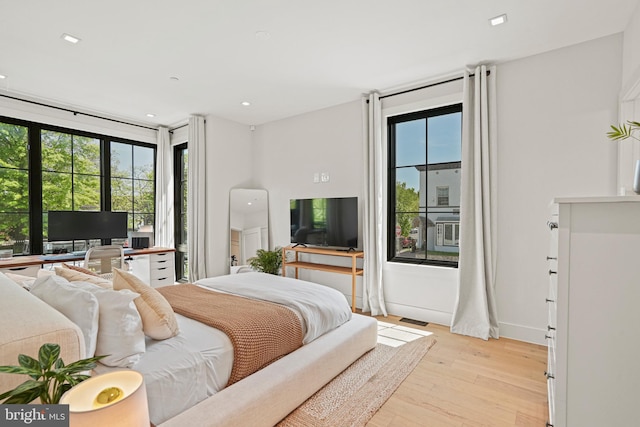 bedroom featuring light hardwood / wood-style flooring