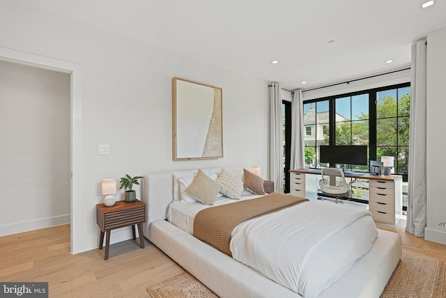 bedroom featuring light wood-type flooring