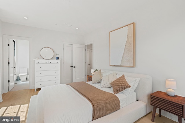 bedroom featuring light hardwood / wood-style floors