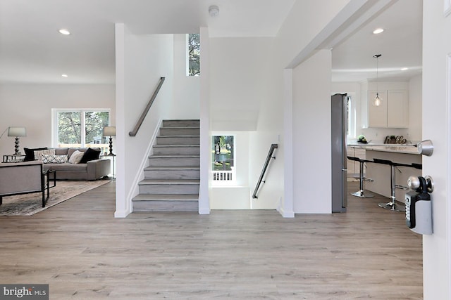 stairway with wood-type flooring