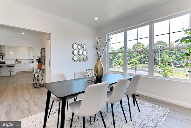 dining area featuring light hardwood / wood-style flooring