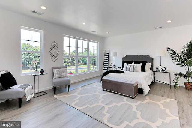 bedroom with light hardwood / wood-style floors