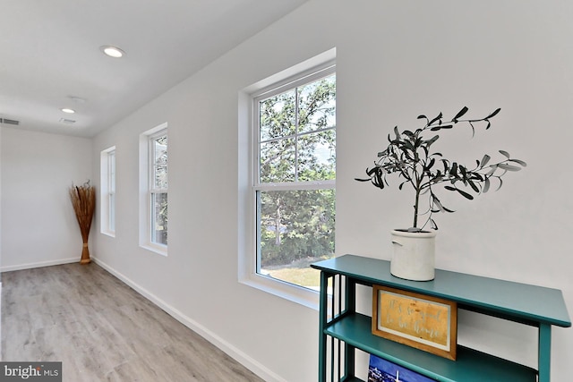 interior space with hardwood / wood-style floors