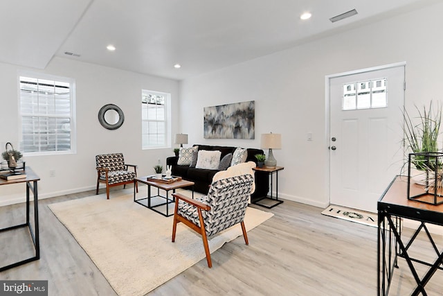 living room featuring light hardwood / wood-style floors