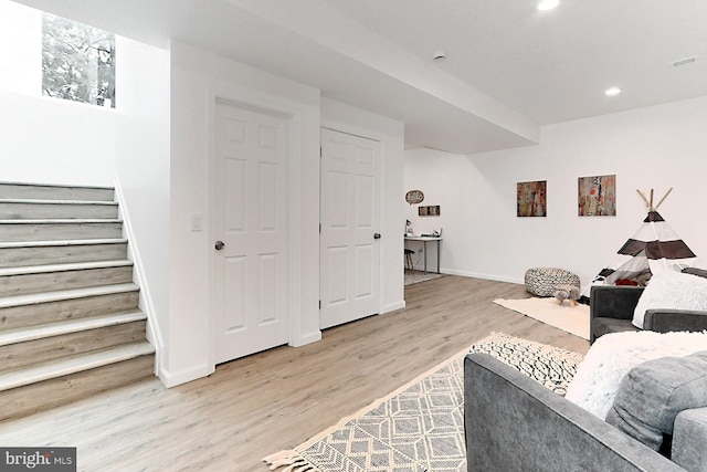 living room with wood-type flooring